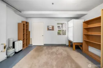 Flex Space, think exercise or hobby room. Has a second Fridge.