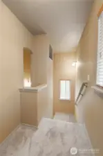 View from the top of the stairs. More windows for natural light.