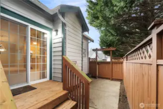 Deck and patio area with access from both the Primary Bedroom & the Living Room