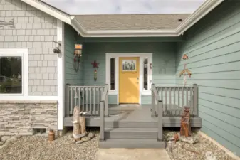 front entrance with a deck