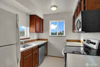 This galley style kitchen has a practical layout with plenty of potential for your personal touches.