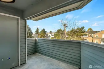 The private covered balcony has room for colorful potted plants and outdoor seating. Don't miss the external storage closet (one of two), perfect for storing seasonal items.