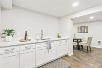 Downstairs wet bar could easily be convereted to full kitchen