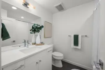 Photos of model home 9213 with similar finishes & floor plan.