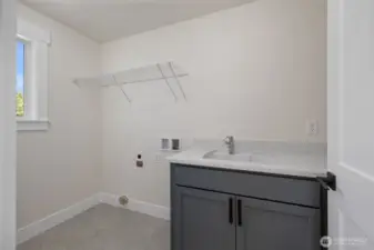 Laundry room on upper level