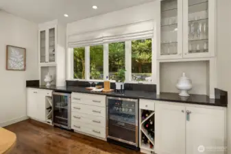 Built-in dining room buffet bar, cabinetry, wine storage & 2 undercounter beverage fridges