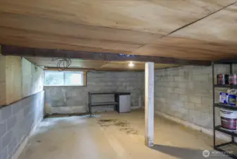 Basement is great for storage or hobbies, accessed from outside the house.