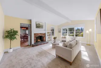 Vaulted ceilings and abundant windows make the room feel roomy and bright