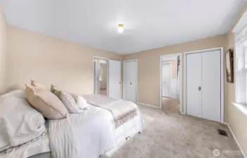 Primary Bedroom features 3 separate closets, including an extra large walk in storage room
