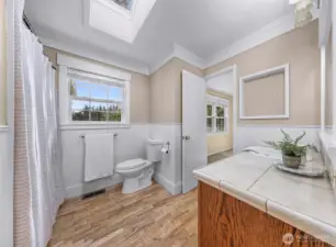 Full Bath on the main floor with direct access to Primary Bedroom