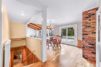 Stairs lead to unfinished basement
