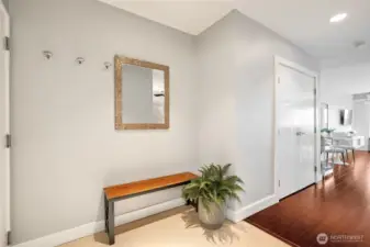 Gracious entry foyer for coats, shoes and greeting your guests