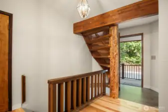 Entry way with stairs up to reading nook loft