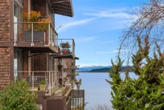 Coveted top-floor unit with a lovely view of the mountains, sound and   Cormorant  Cove.
