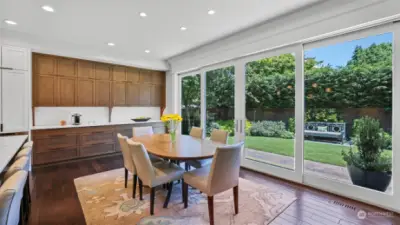 Expansive 4 panel sliding glass doors brings the outdoors in!