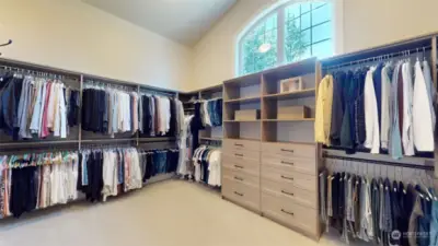 Enormous walk-in closet has its own washer and dryer hookup.
