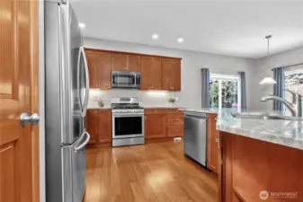 Kitchen has been extensively remodeled w/ soft close cabinetry, new stone counter tops, flooring and appliances.