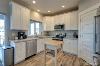 Beautiful kitchen with stainless steel appliances and granite countertops.