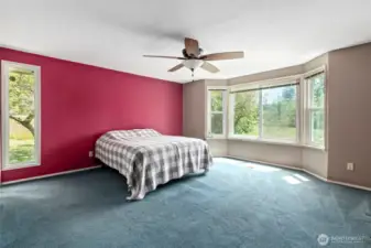 Primary bedroom with bay window