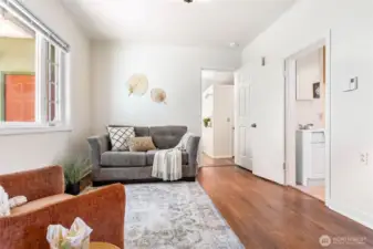 Super cute and cozy living room, or easily transform it into a bedroom with a nearby closet and bathroom.
