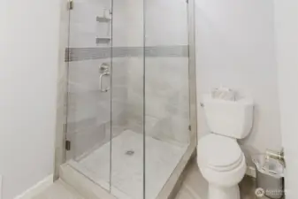 The 3/4 bath on the first floor with access to the "office area".