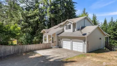 Nestled among lush evergreens for a peaceful, wooded setting~
