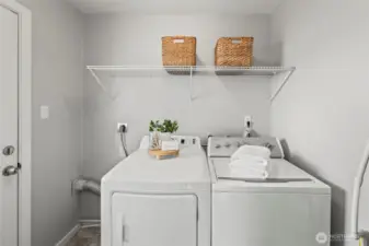 Laundry room with exit to side yard