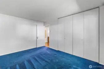 The larger of the two bedrooms includes a full wall of closet space.