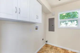 Laundry with storage.