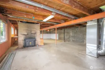 HUGE daylight basement with fireplace and high ceilings