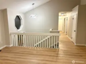 Main floor view of front entry and hallway.