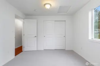 Bedroom #3 on the upper level w/access to the attic.