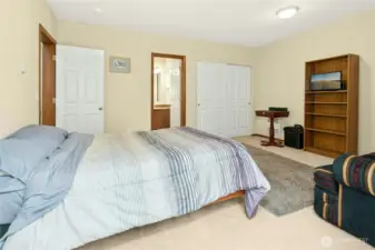 Convenient downstairs suite with full bathroom offers flexibility and comfort.