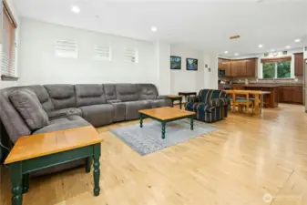 Generous living room perfect for gathering, relaxing, or entertaining