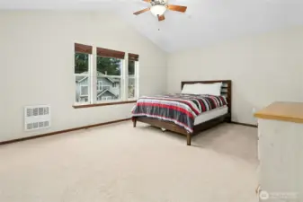 Spacious primary suite designed for comfort and privacy.