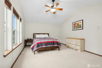 Expansive primary suite with abundant natural light and room to truly unwind.