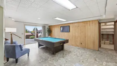 Pool table stays, it's currently on the lower level