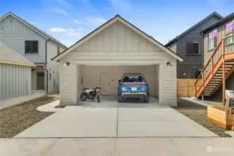 "Right Sized" 22' wide 2-Car Garage features a 240v Level-2 EV charging outlet.