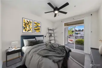 Virtually Staged Primary Bedroom with balcony