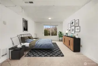 Virtually staged lower level bedroom.