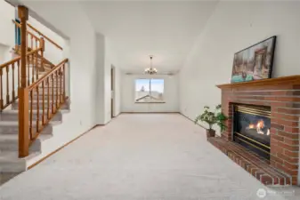 At the entry, there is a foyer, stairs to the 2nd level, and this large living room to the right.