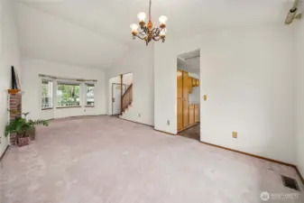 Showing the layout into the kitchen, while standing in the dining area.