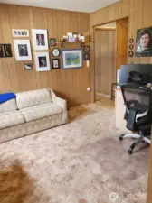 Angle of second bedroom from bathroom door.