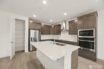 Corner of Island looking at Pantry and appliances