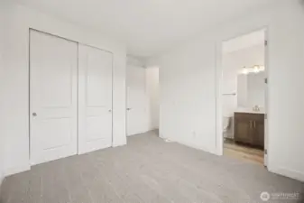 Upstairs secondary bedroom with full bath