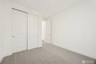 Main floor bedroom next to bathroom