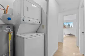 Stackable washer and dryer in your and brand new hot water tank.