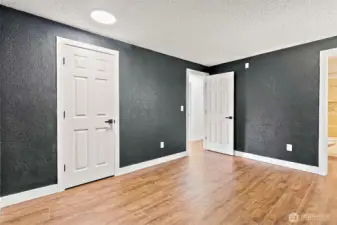 primary bedroom with ensuite and walk in closet. view looking back towards the door.
