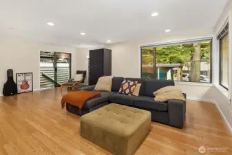 Full of windows and direct access to your backyard thru sliding doors