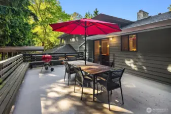An amazing deck is just outside the sliding door in the kitchen perfect for relaxing and entertaining.